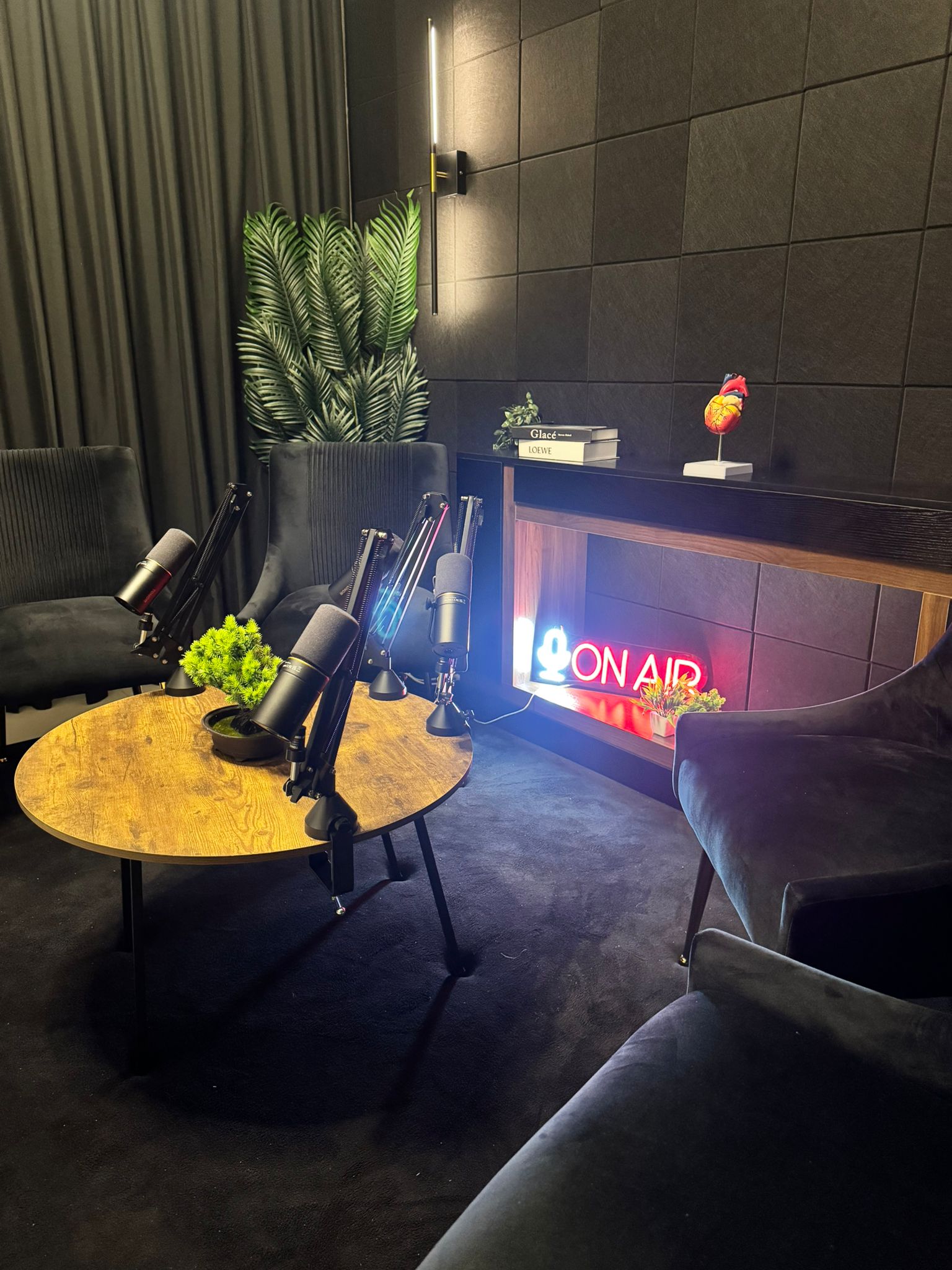 Dubai Sports City podcast studio — wide view with ON AIR neon